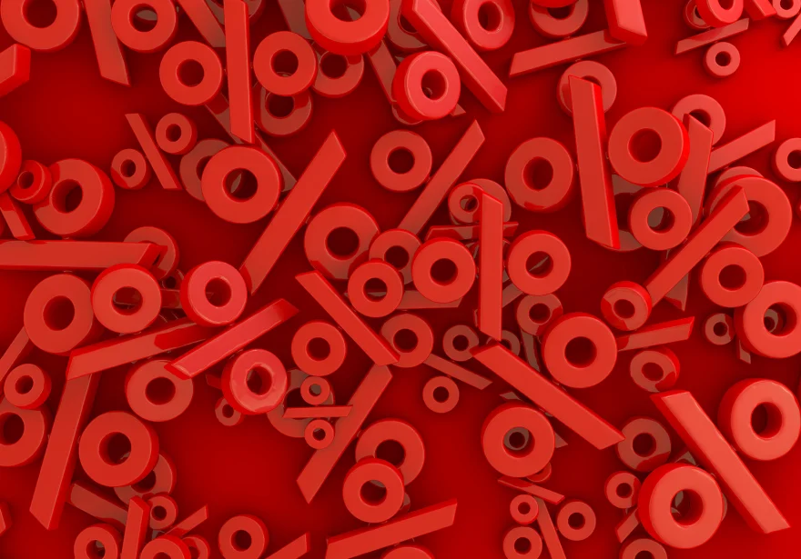 Rote Prozentzeichen in verschiednen Größen auf rotem Hintergrund